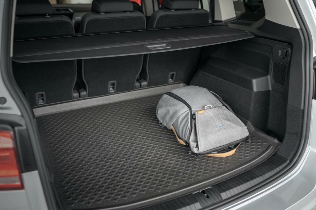A backpack in a car trunk (Volkswagen Touran).